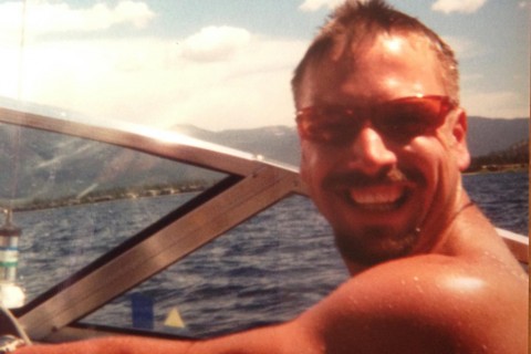 Pat at the controls of a speedboat during one of the annual Tahoe Trips with his childhood friends