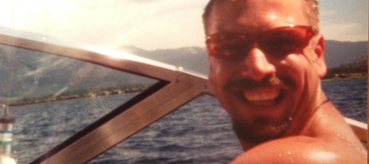 Pat at the controls of a speedboat during one of the annual Tahoe Trips with his childhood friends