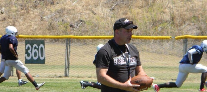 Coach Troya in his element – on the field before an Elsie Allen HIgh School Football Game.